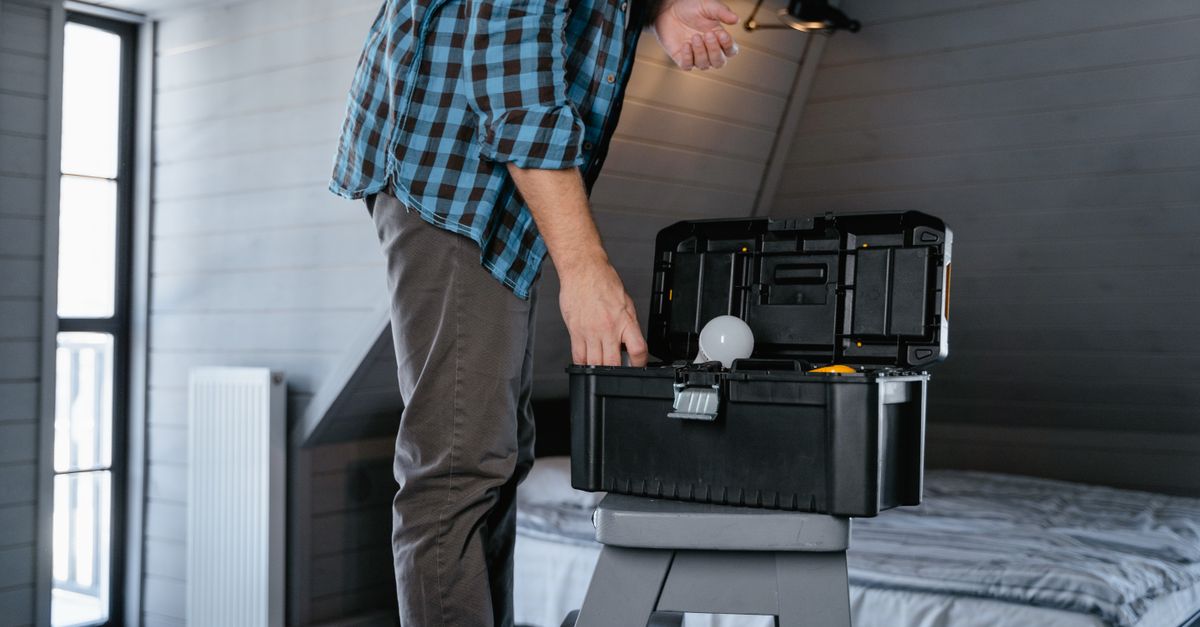 technician toolbox house entrance — Top Locksmith Pro